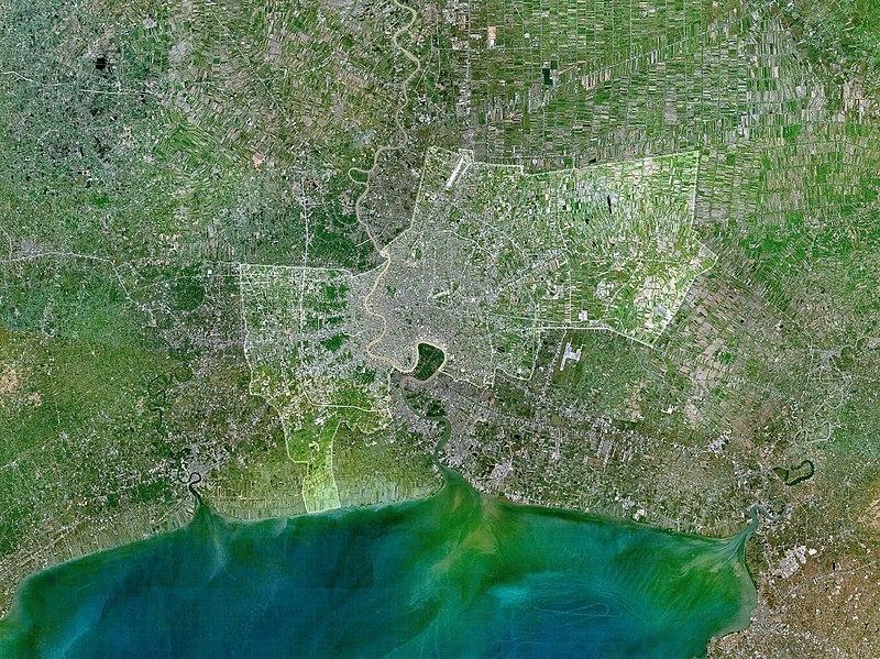 The Bangkok city proper is highlighted in this satellite image of the lower Chao Phraya delta. Notice the built-up urban area along the Chao Phraya River, which extends northward and southward into Nonthaburi and Samut Prakan Provinces.